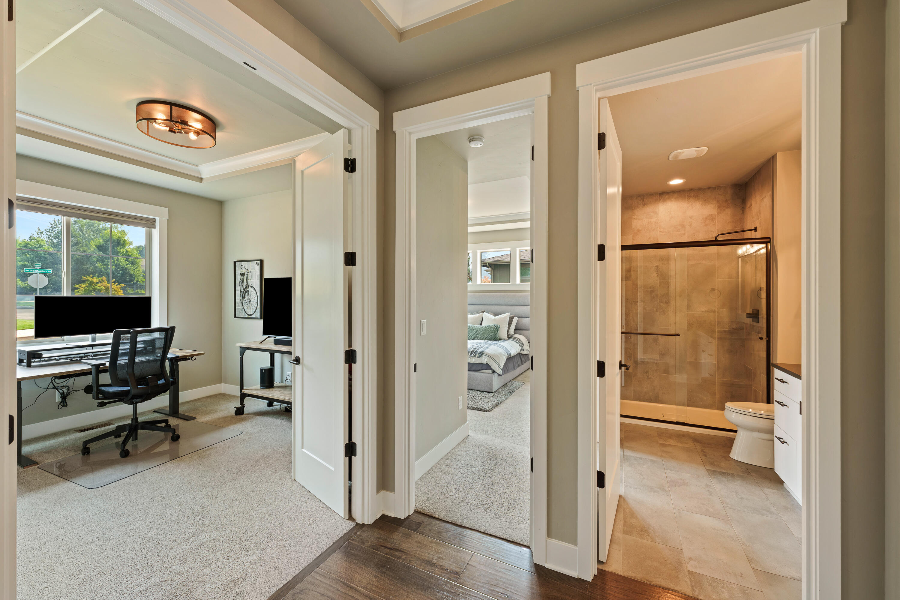 60869 Southwest Headwaters Loop Bend, OR 97702 - Photo 28 of 50 Private office near entry, entrance to guest suite with access to guest bathroom in hallway