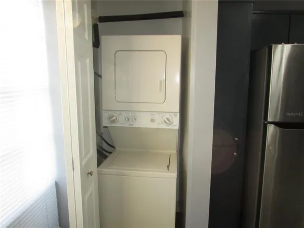 a view of a park with large trees