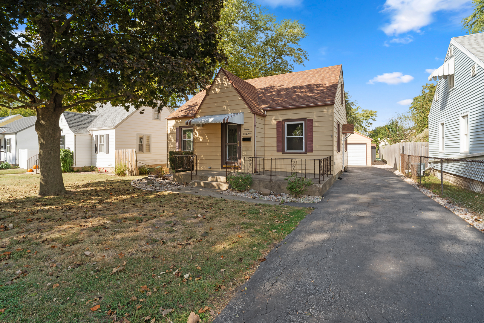 1149 Wilson Drive Kankakee, IL 60901 - Photo 1 of 23 a front view of a house with a yard