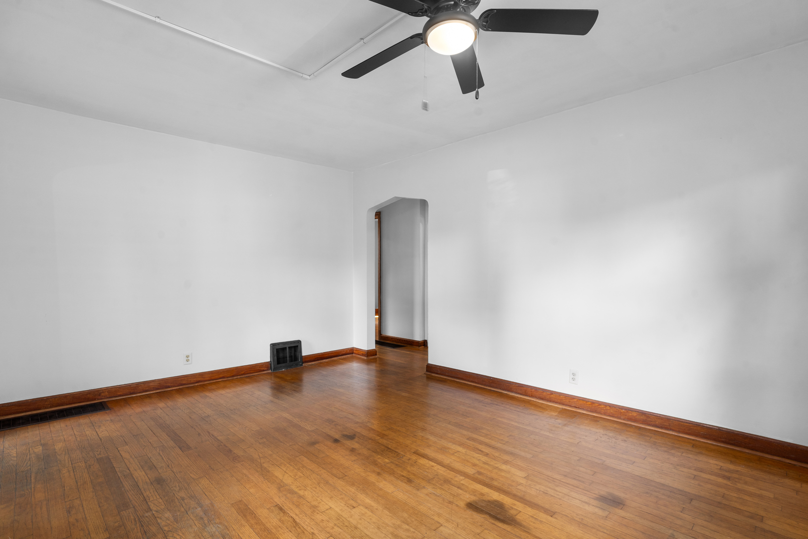 1149 Wilson Drive Kankakee, IL 60901 - Photo 5 of 23 a view of an empty room with wooden floor