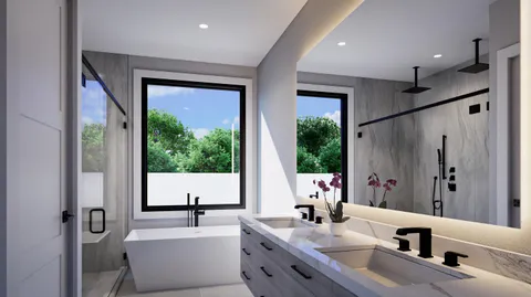 a bathroom with a double vanity sink a mirror and a bathtub