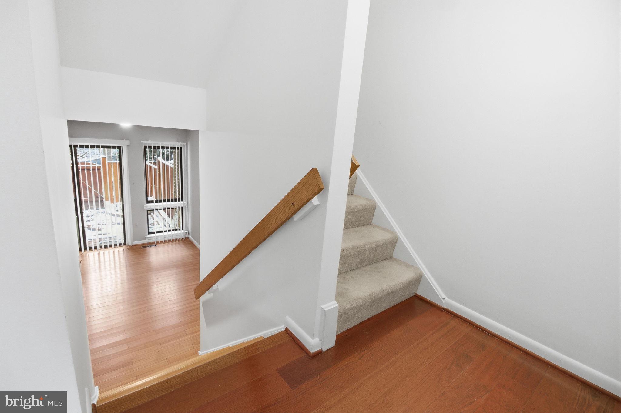 10995 Thrush Ridge Road Reston, VA 20191 - Photo 13 of 30 a view of entryway and hall with wooden floor