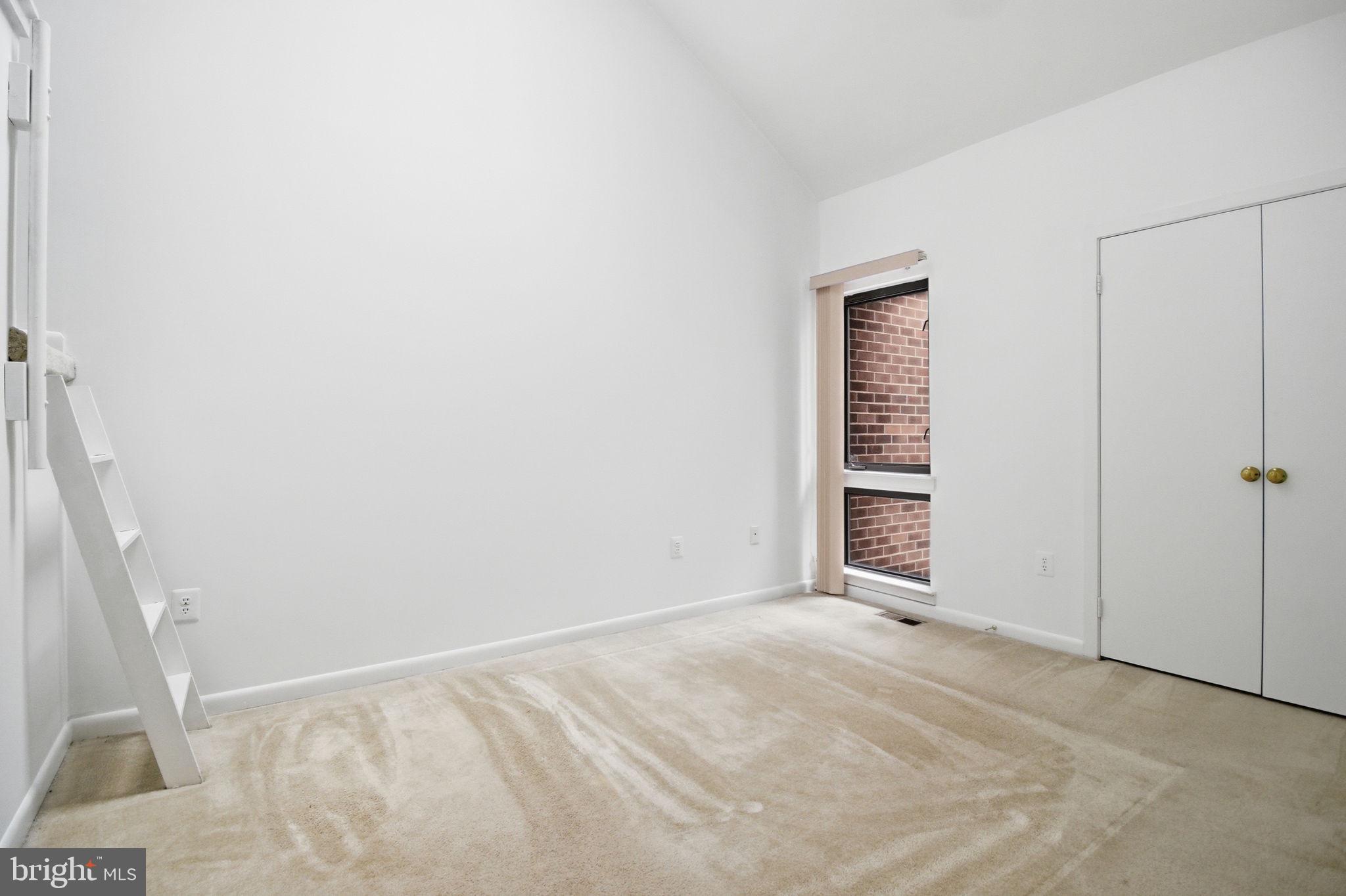 10995 Thrush Ridge Road Reston, VA 20191 - Photo 22 of 30 a view of an empty room with a window