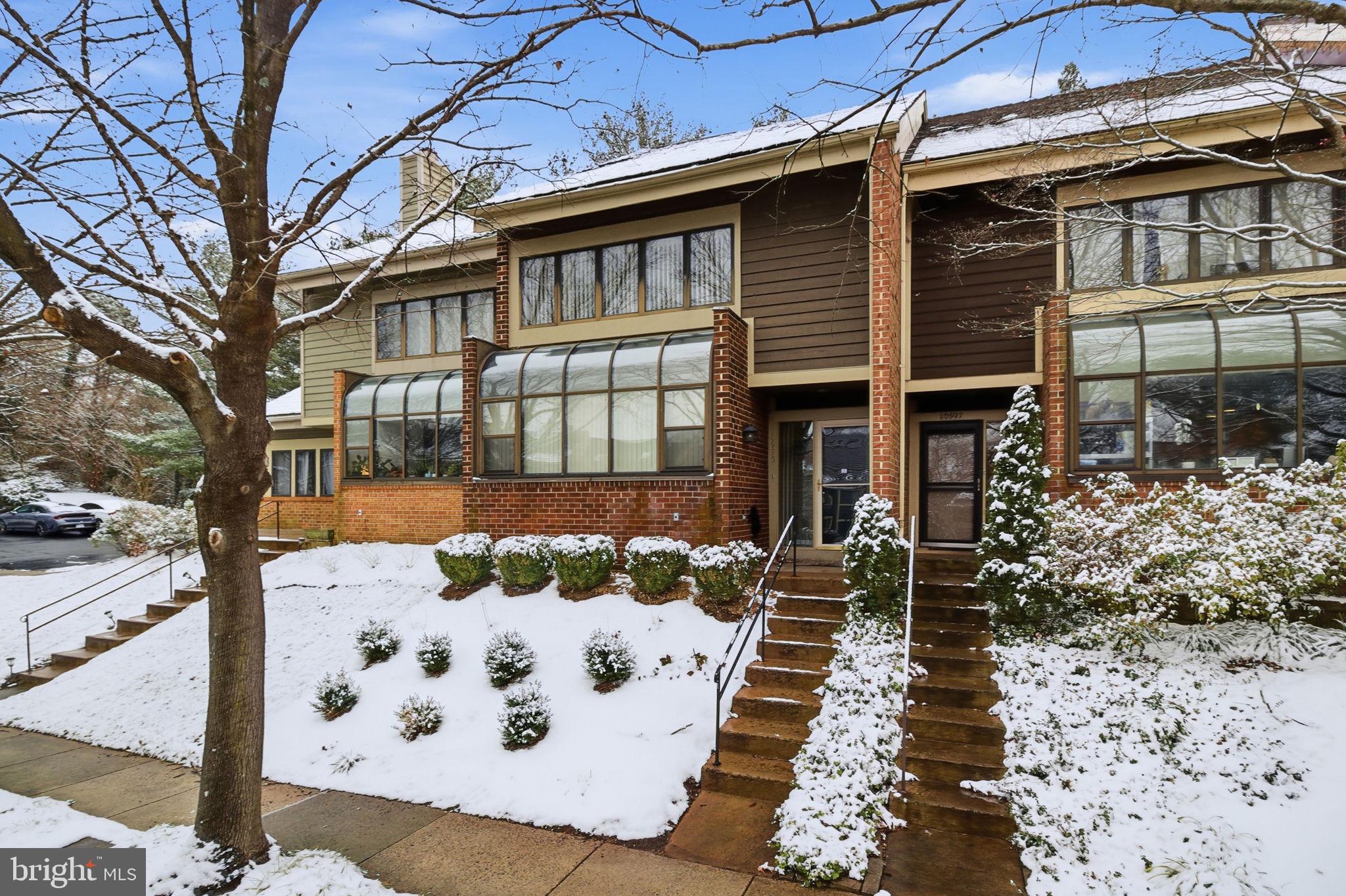 10995 Thrush Ridge Road Reston, VA 20191 - Photo 3 of 30 a view of a house with a yard and sitting area