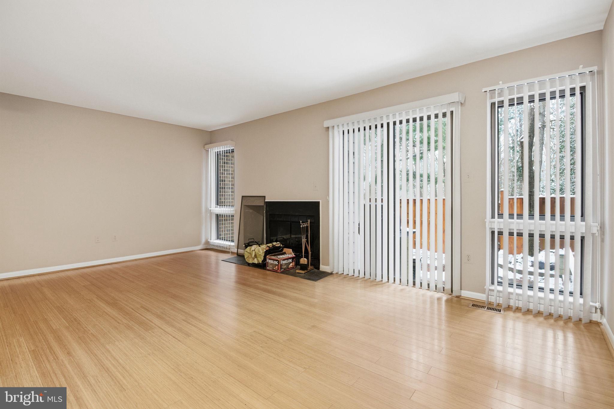 10995 Thrush Ridge Road Reston, VA 20191 - Photo 8 of 30 a view of a livingroom with a fireplace