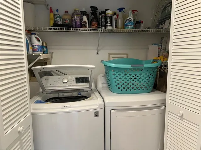 a utility room with dryer and washer