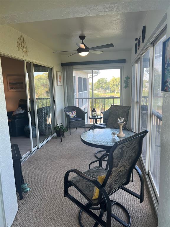 6501 Stone River Road, Unit 309 Bradenton, FL 34203 - Photo 33 of 33 a view of a livingroom with furniture and a table