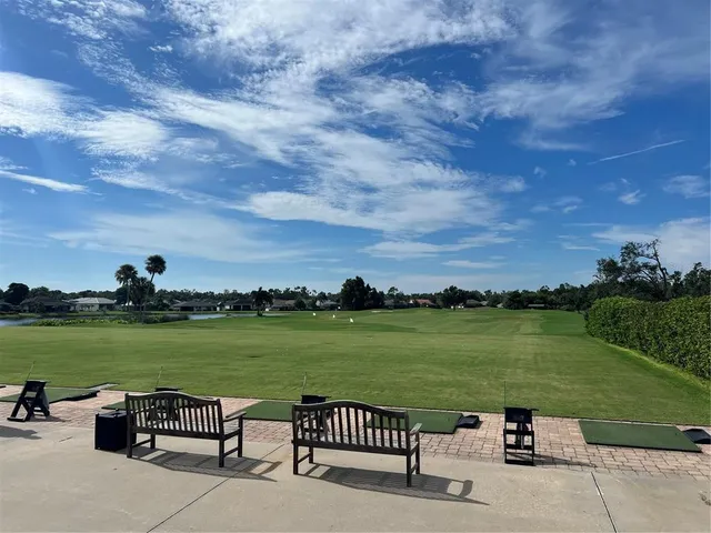 a view of a wooden deck with a garden