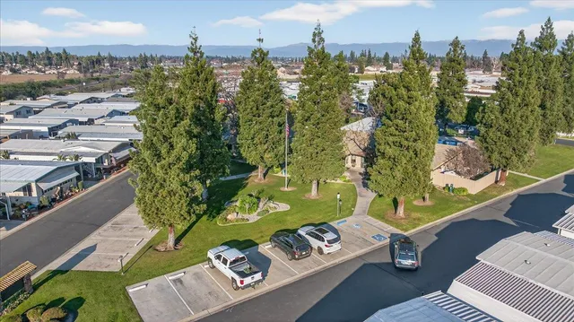 a kitchen with stainless steel appliances granite countertop a sink and a counter space
