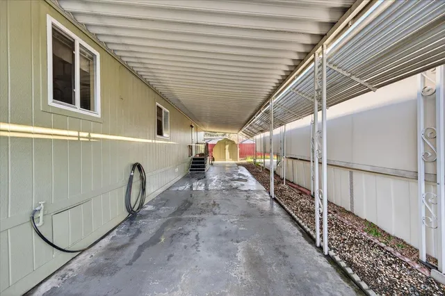 a view of a garage with wooden floor