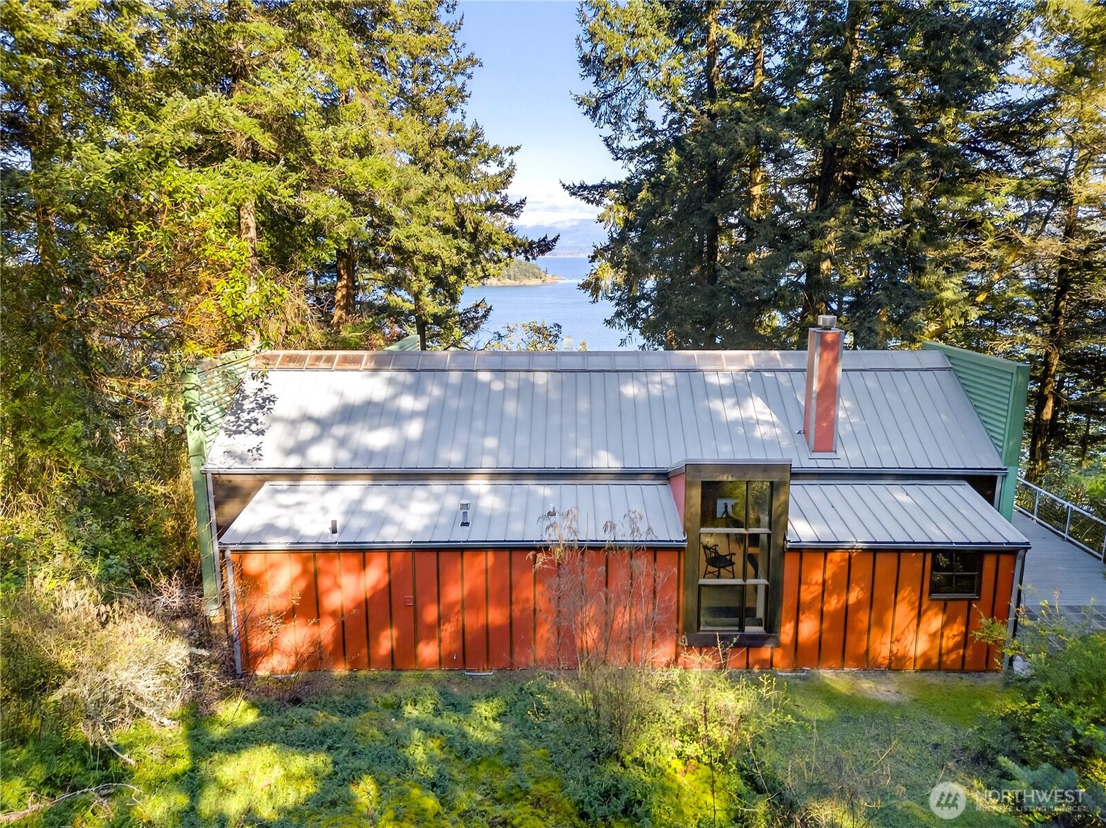 7457 Holiday Boulevard Anacortes, WA 98221 - Photo 20 of 23 a view of backyard with swimming pool and outdoor seating