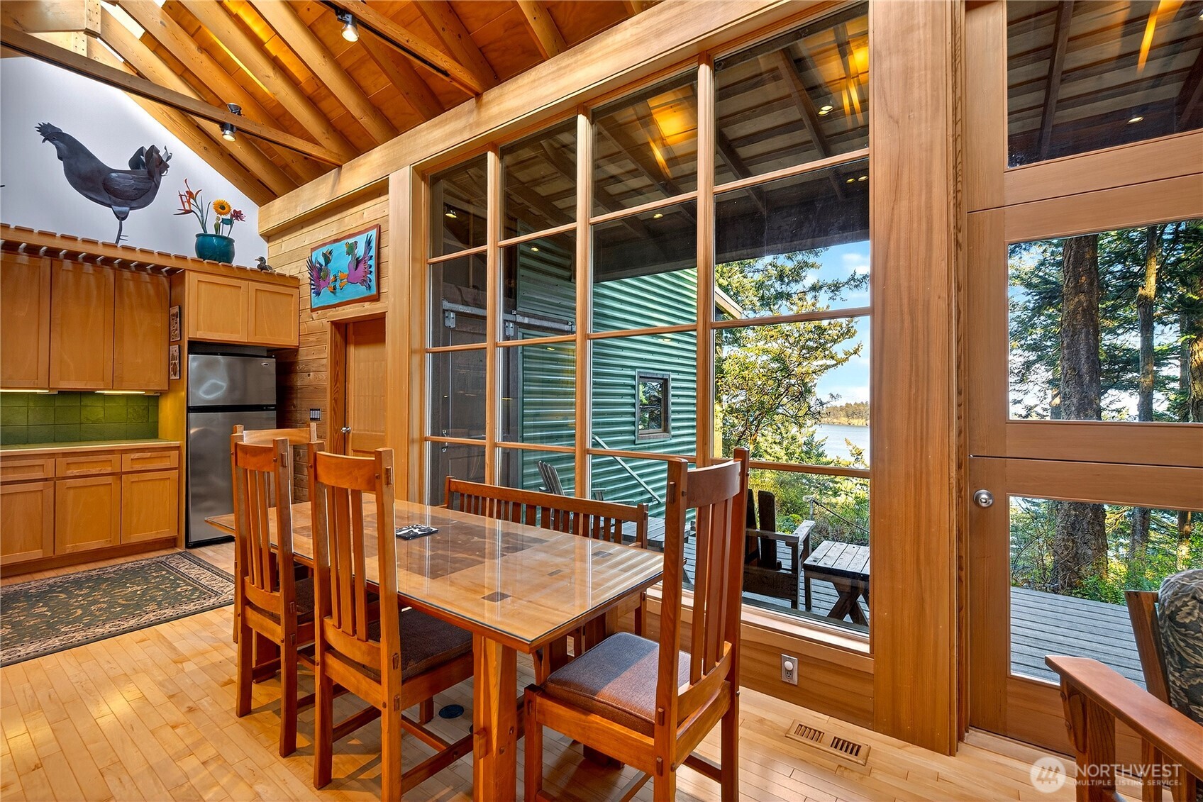 7457 Holiday Boulevard Anacortes, WA 98221 - Photo 10 of 23 a outdoor dining space with furniture and outdoor view
