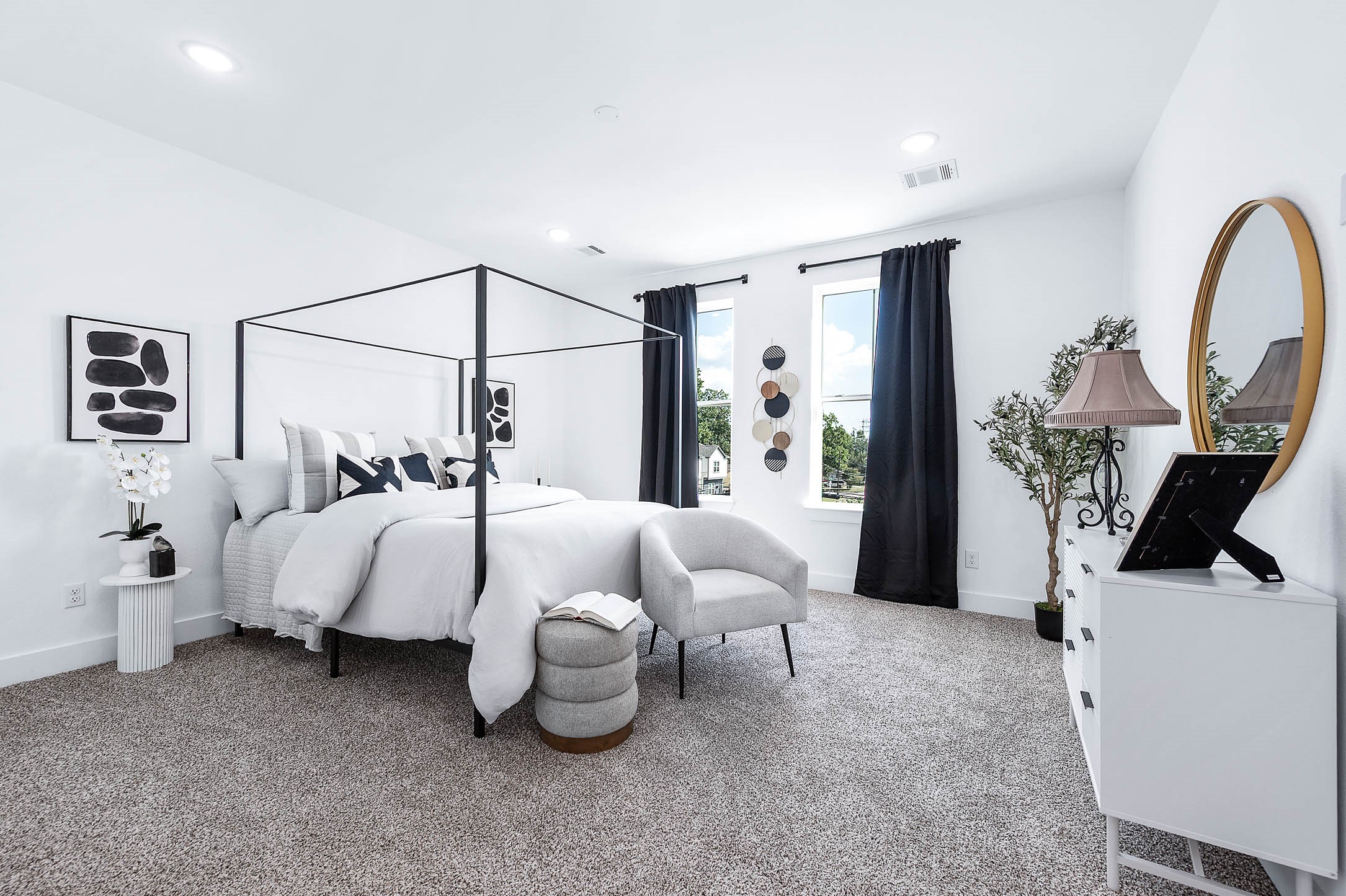 1515 Euel Street Houston, TX 77009 - Photo 24 of 34 Spacious and serene primary suite designed for comfort and relaxation, featuring plush carpeting, soft natural light, and ample room for a king-sized bed and additional seating.