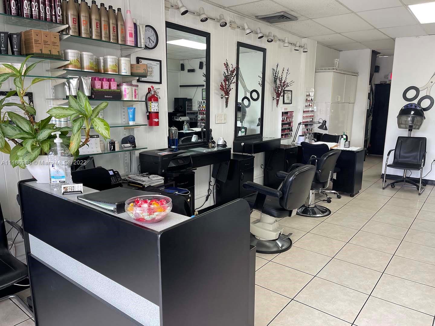 Miami Miami, FL 33135 - Photo 4 of 14 a kitchen with stainless steel appliances kitchen island granite countertop a table and chairs in it