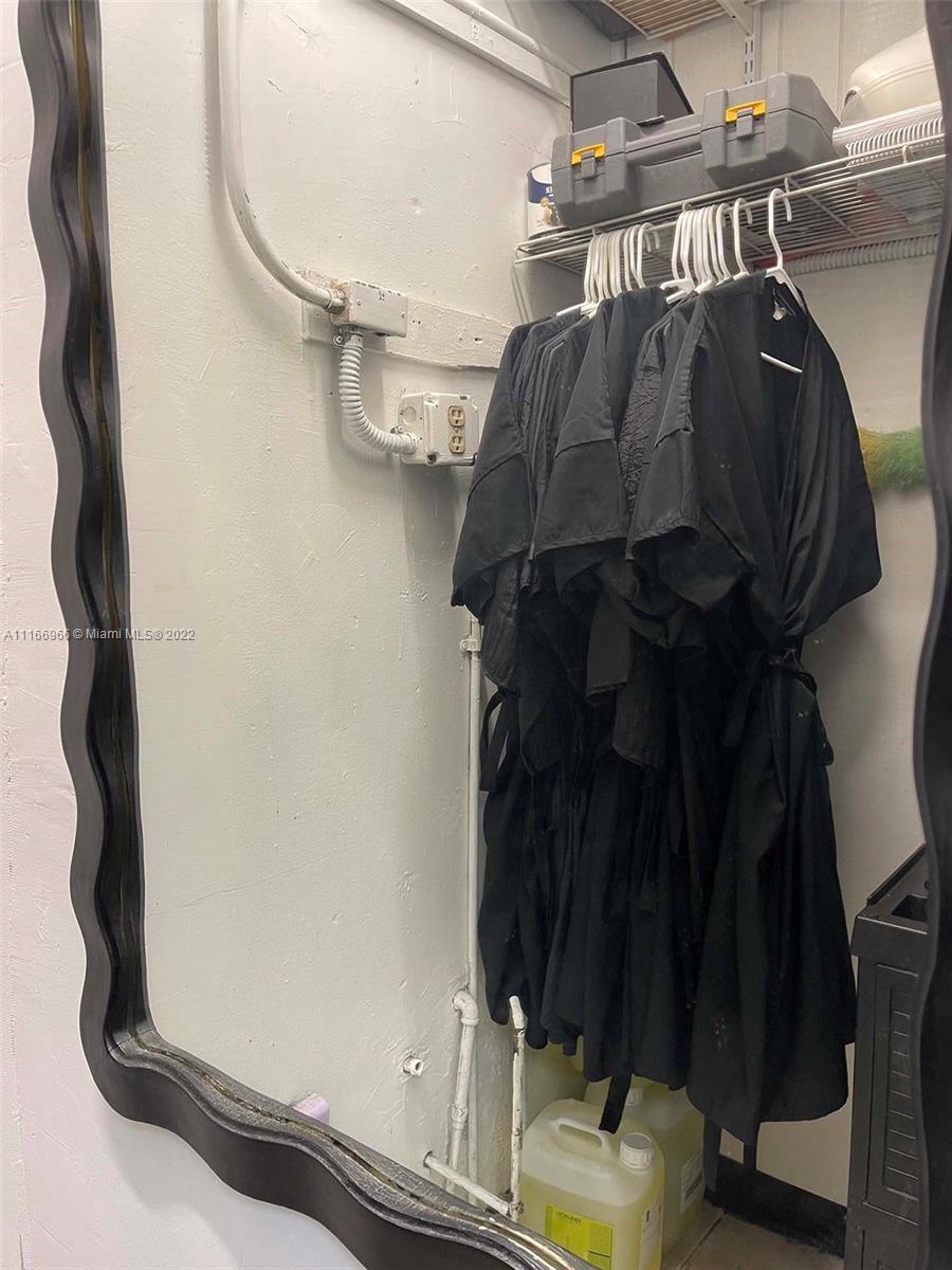 Miami Miami, FL 33135 - Photo 9 of 14 a view of walk in closet with clothes and shoes