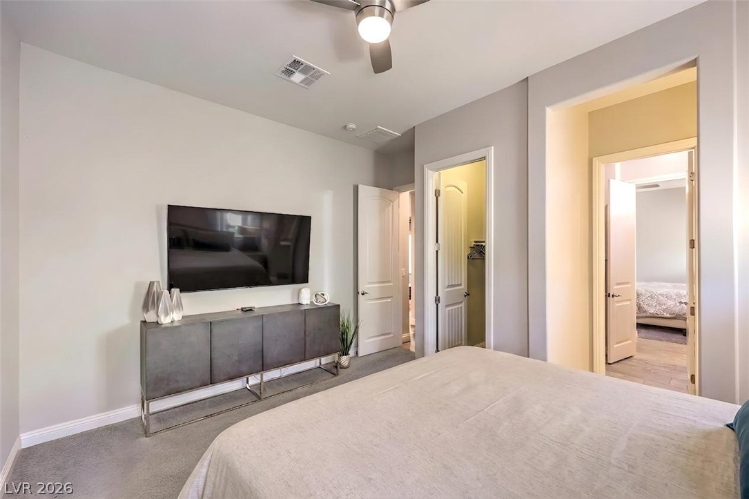 7119 Arabian Ridge Street Las Vegas, NV 89131 - Photo 31 of 73 The sleeping quarters offer a welcoming atmosphere, providing a private sanctuary for ultimate relaxation.