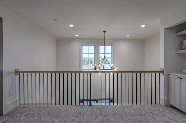 a view of hallway with a window