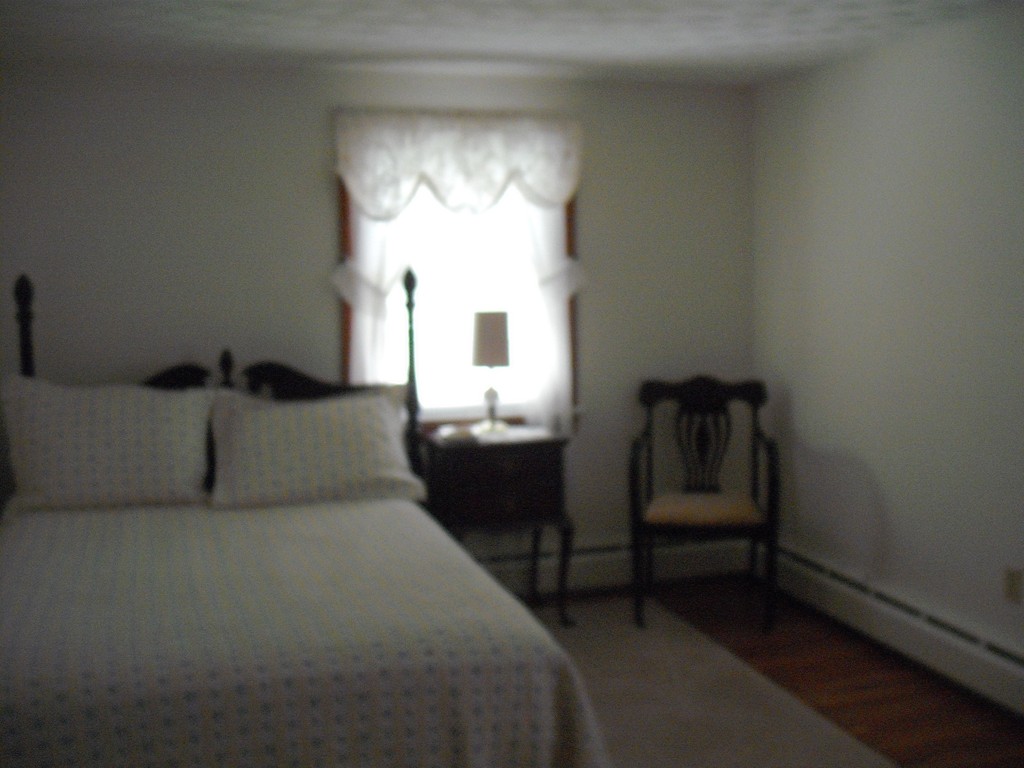 171 Maple Avenue Rutland, MA 01543 - Photo 14 of 25 a bed room with a bed and a window
