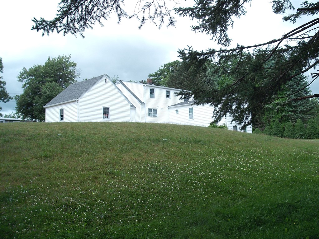 171 Maple Avenue Rutland, MA 01543 - Photo 2 of 25 a view of house with a big yard