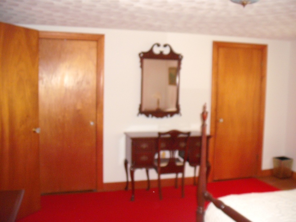 171 Maple Avenue Rutland, MA 01543 - Photo 21 of 25 a room with a table and a mirror