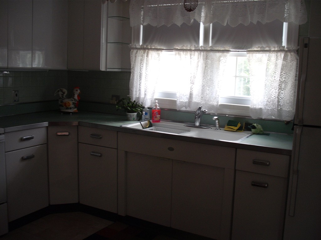 171 Maple Avenue Rutland, MA 01543 - Photo 22 of 25 a kitchen with a sink cabinets and window