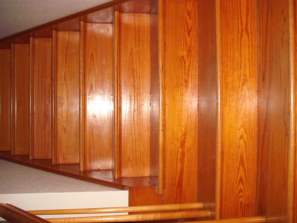 171 Maple Avenue Rutland, MA 01543 - Photo 23 of 25 a view of a large window with curtain and wooden walls