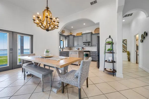 a view of a dining room kitchen and a window