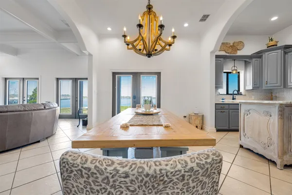 a kitchen with stainless steel appliances granite countertop a sink and cabinets