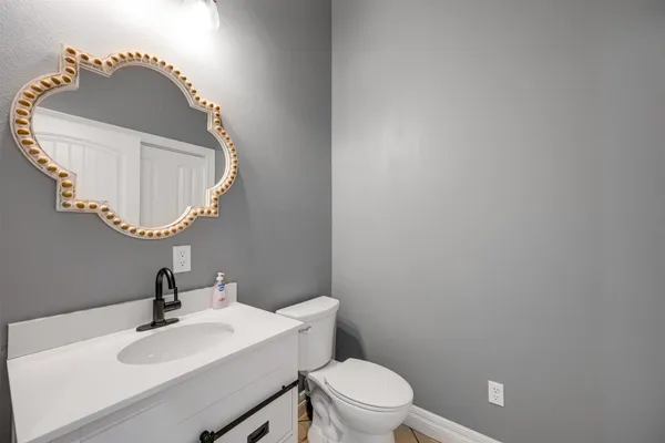 a view of a patio with a garden