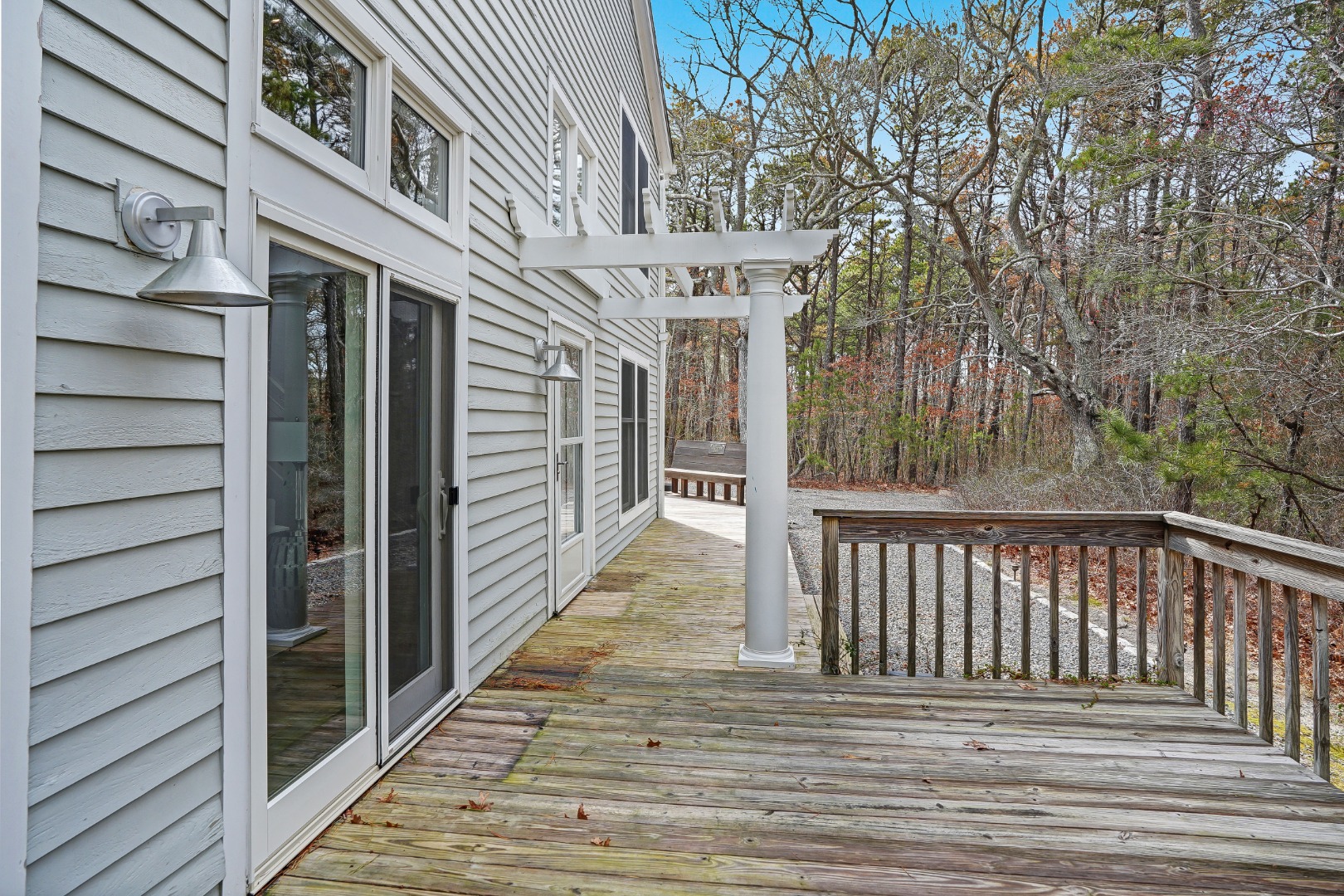 150 Cove Road, Unit 10 Vineyard Haven, MA 02568 - Photo 32 of 45 A large deck wraps around the exterior of the unit.