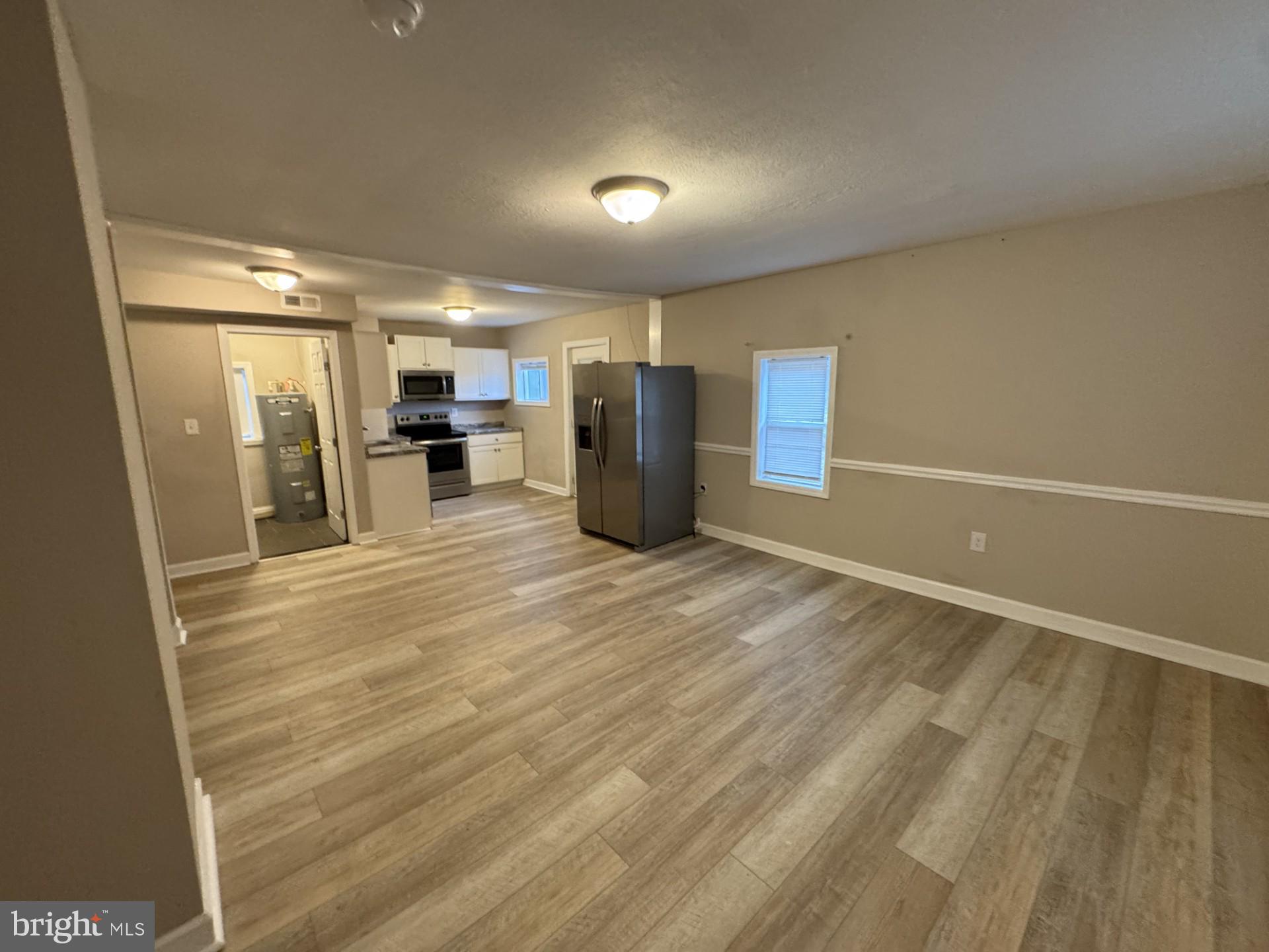 3920 Main Street, Unit A Trappe, MD 21673 - Photo 6 of 16 a view of a room with wooden floor