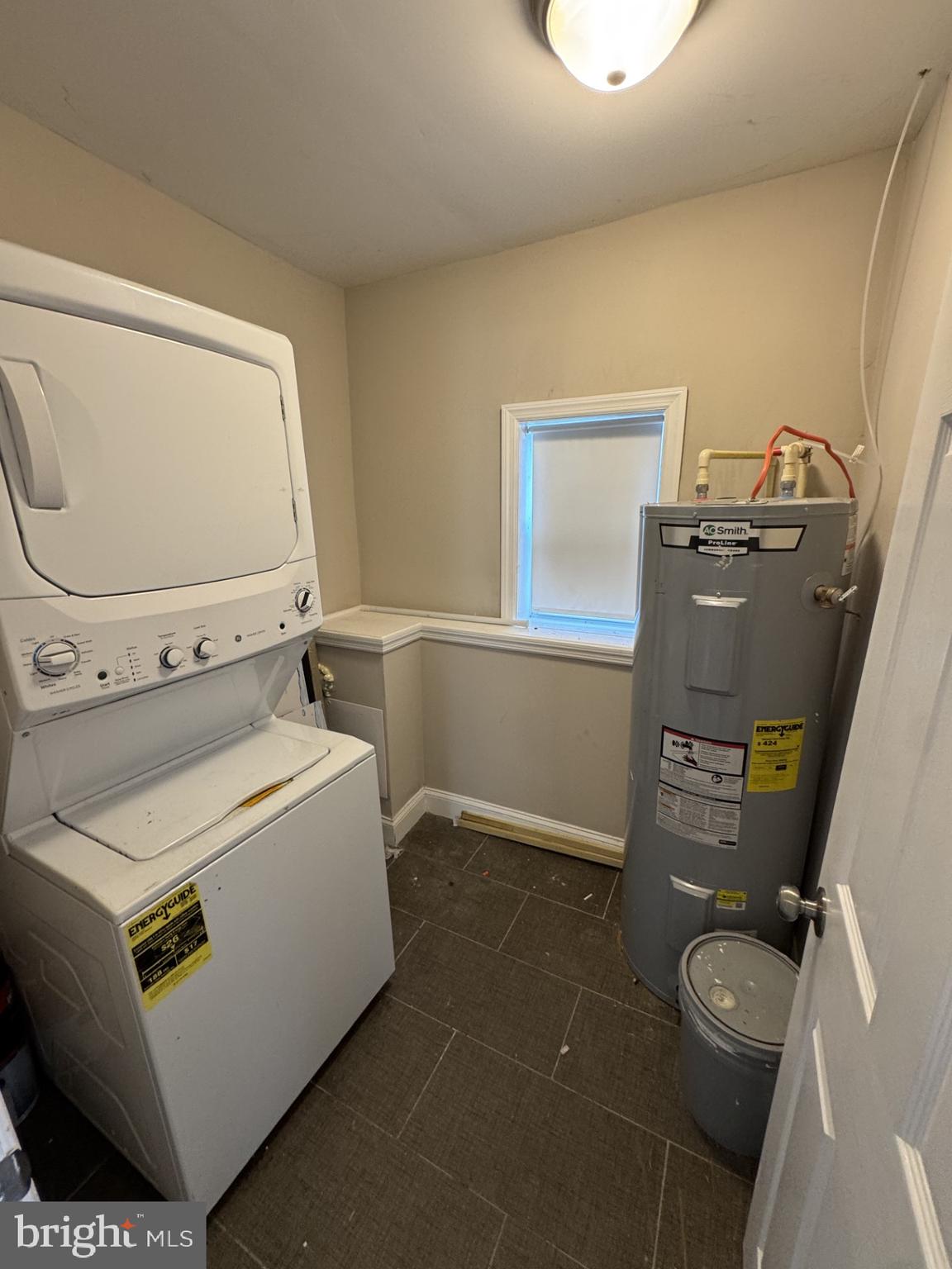 3920 Main Street, Unit A Trappe, MD 21673 - Photo 8 of 16 a utility room with dryer and washer