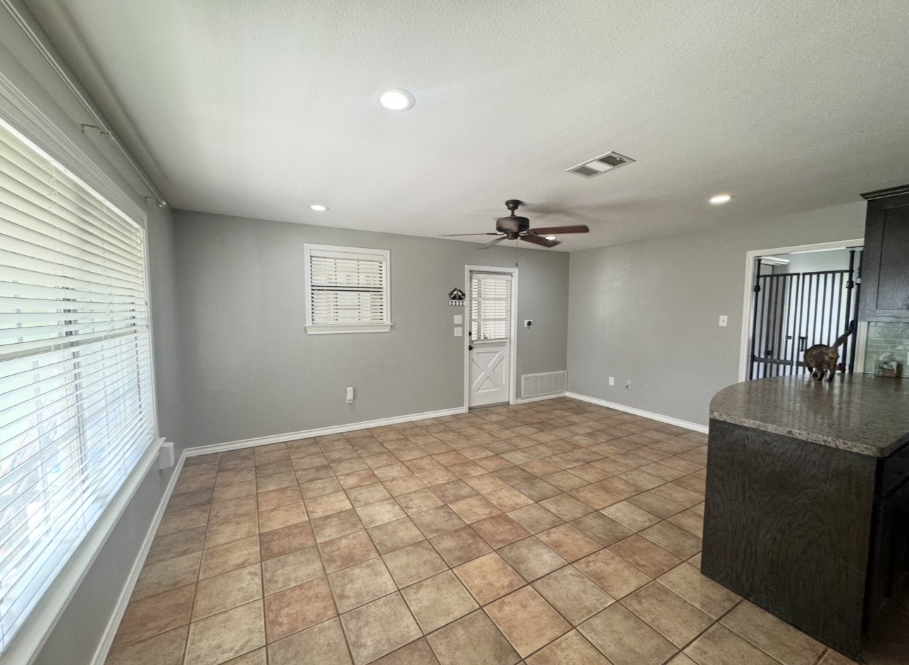 612 Cardinal Street Elgin, TX 78621 - Photo 8 of 28 Unfurnished living room with recessed lighting and a ceiling fan