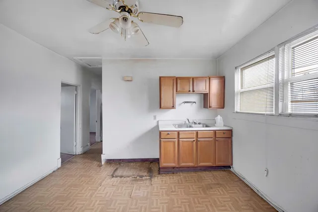 a bathroom with a bathtub a sink and a toilet