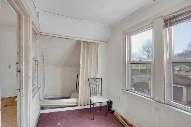 a view of a window in an empty room