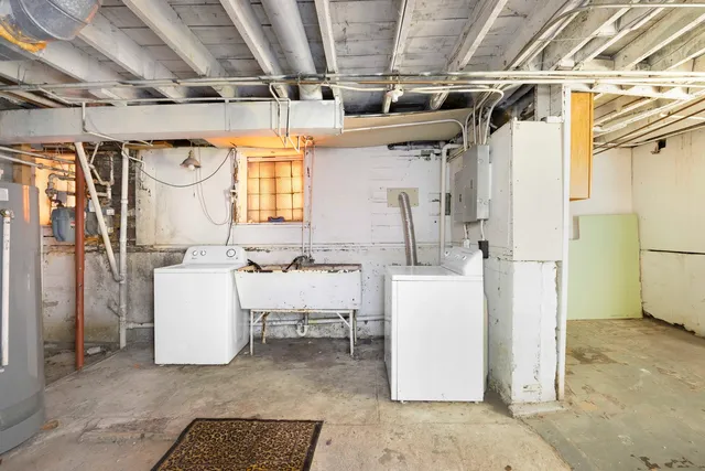 a view of a backyard with swimming pool in the backyard