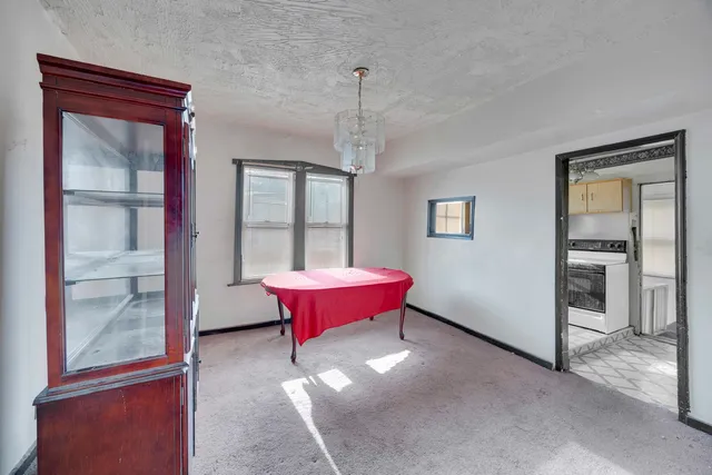 a view of n empty room and window