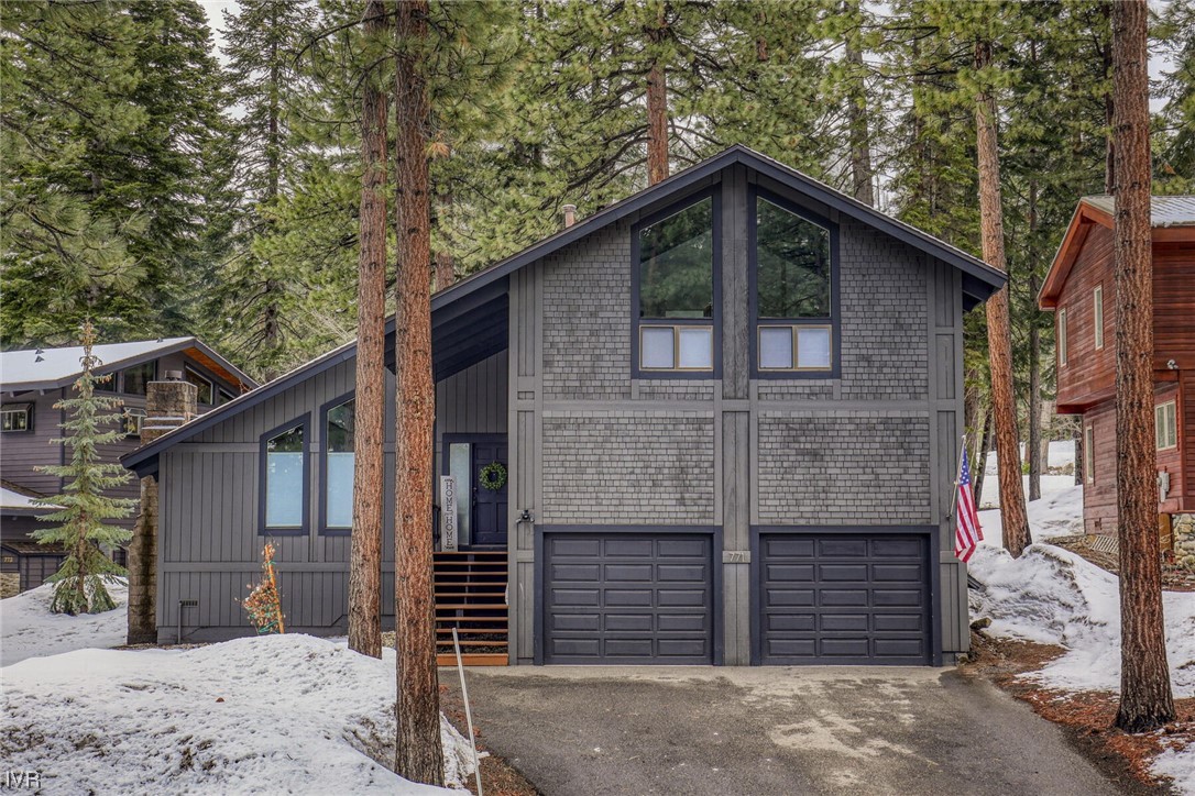 771 Golfers Pass Road Incline Village, NV 89451 - Photo 1 of 26 a front view of a house with a yard