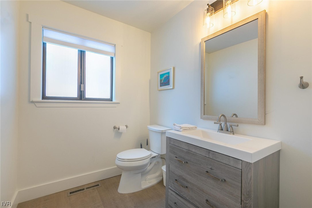 771 Golfers Pass Road Incline Village, NV 89451 - Photo 17 of 26 a bathroom with a toilet sink and mirror