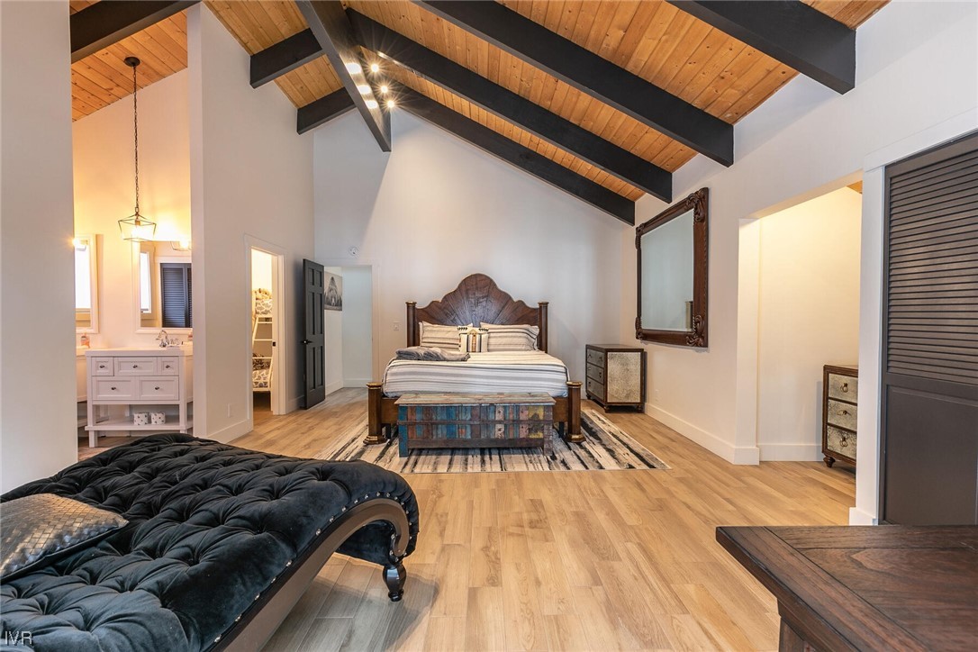 771 Golfers Pass Road Incline Village, NV 89451 - Photo 18 of 26 a bedroom with a bed and wooden floor