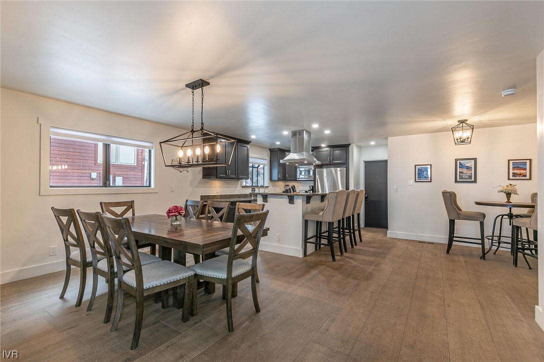 771 Golfers Pass Road Incline Village, NV 89451 - Photo 9 of 26 a view of a dining room with furniture