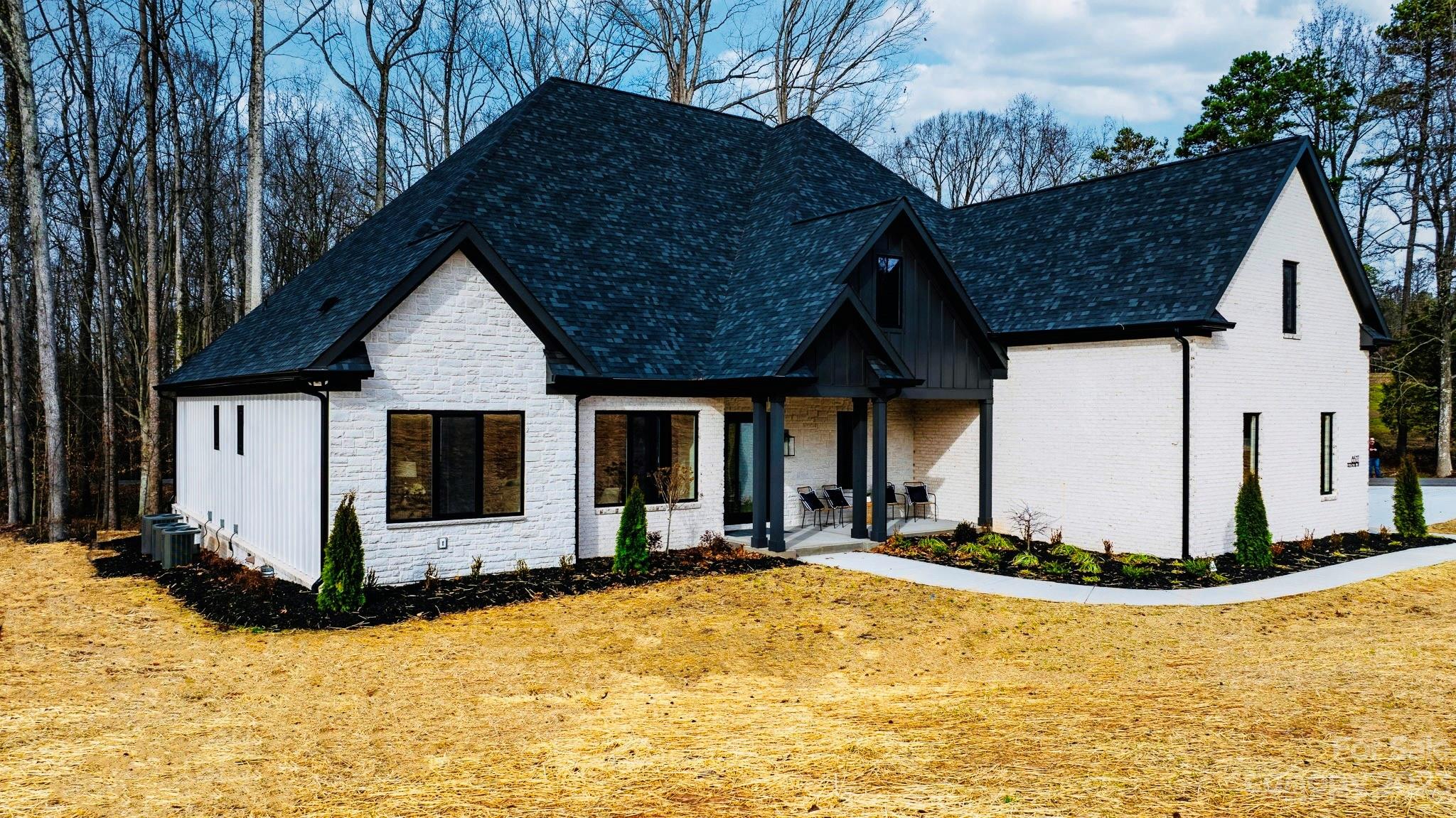 8527 Fieldstone Drive Terrell, NC 28682 - Photo 2 of 48 a front view of a house with a yard
