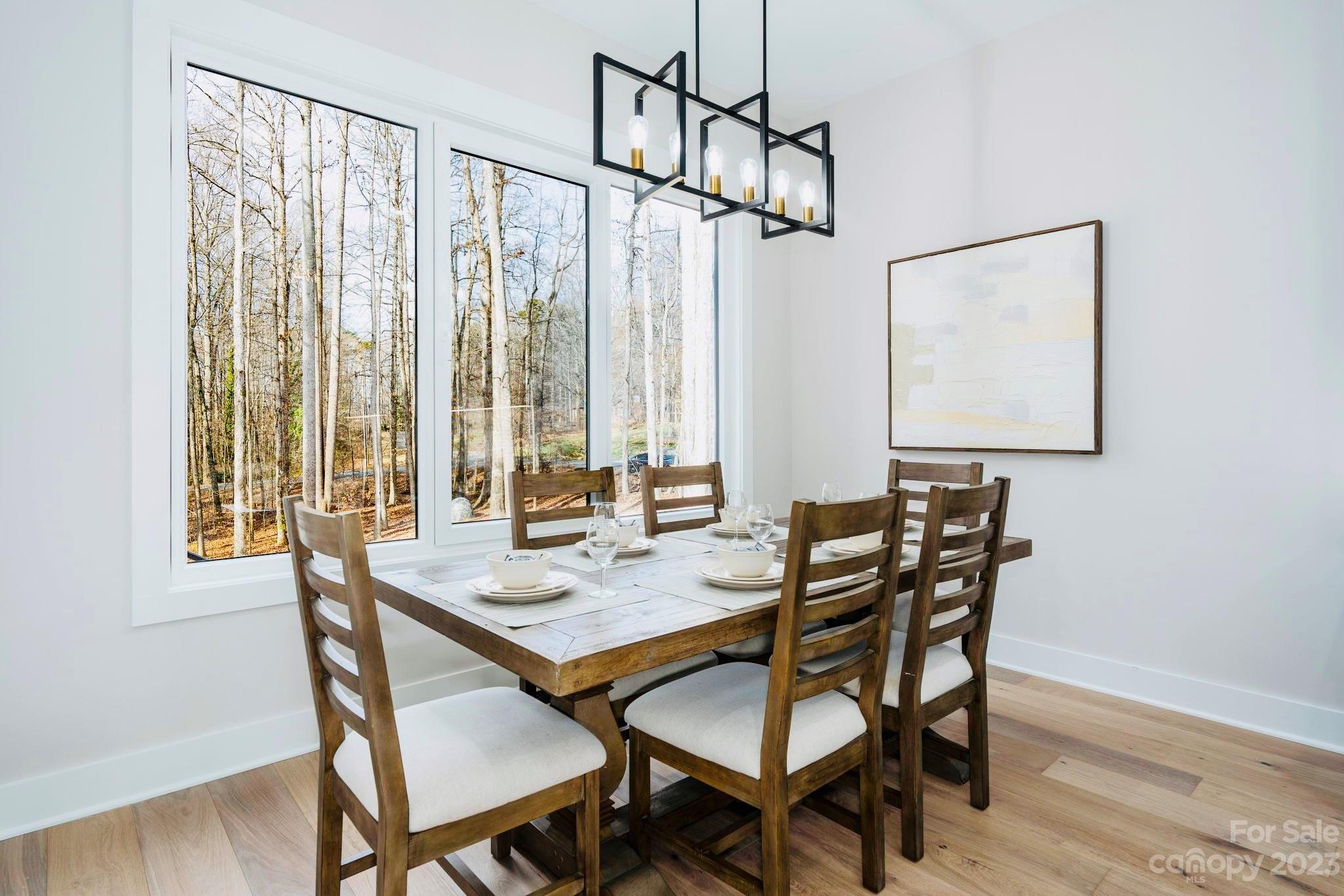 8527 Fieldstone Drive Terrell, NC 28682 - Photo 23 of 48 a view of a dining room with furniture and window
