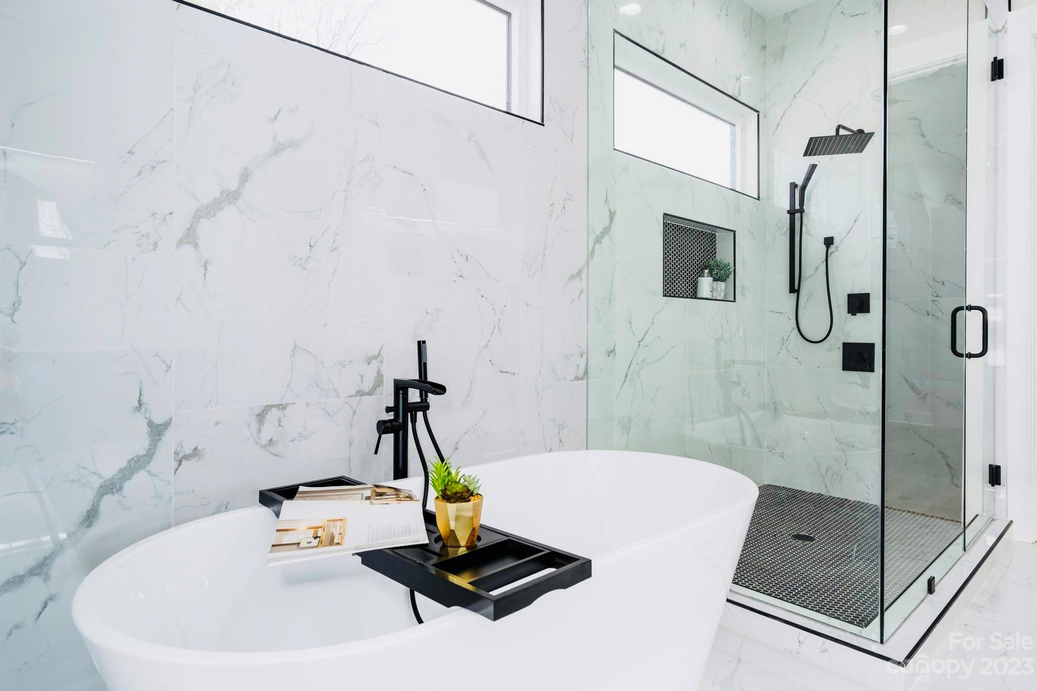 8527 Fieldstone Drive Terrell, NC 28682 - Photo 28 of 48 a bathroom with a sink and a shower