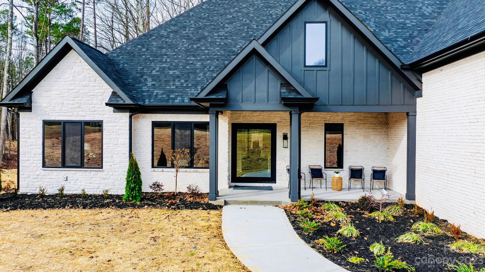 8527 Fieldstone Drive Terrell, NC 28682 - Photo 3 of 48 a front view of a house with garden