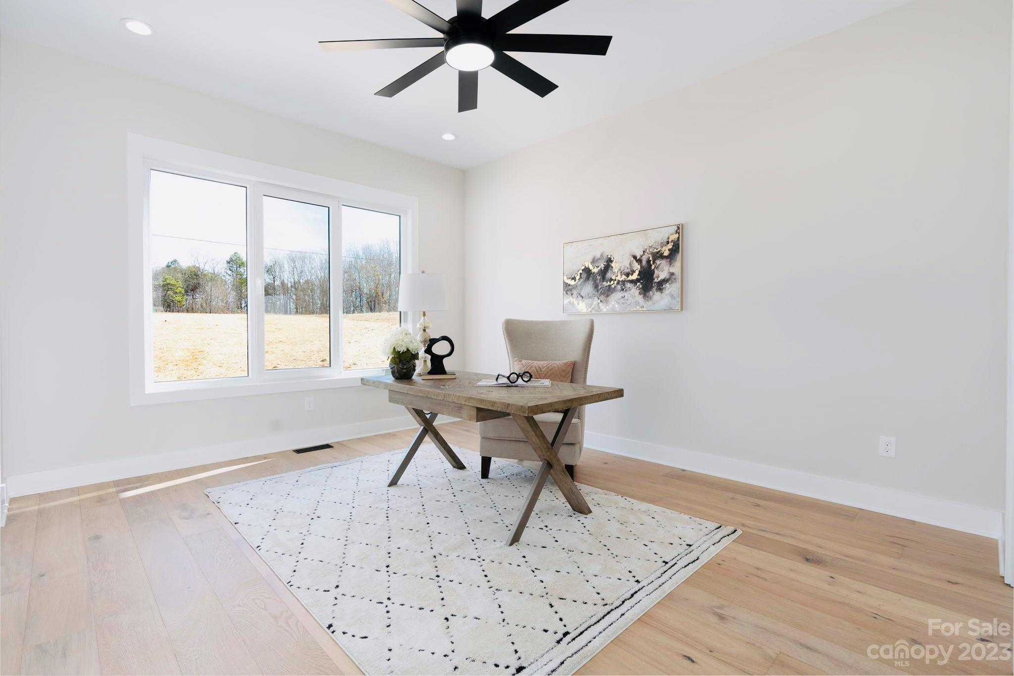 8527 Fieldstone Drive Terrell, NC 28682 - Photo 31 of 48 a workspace with furniture and a window