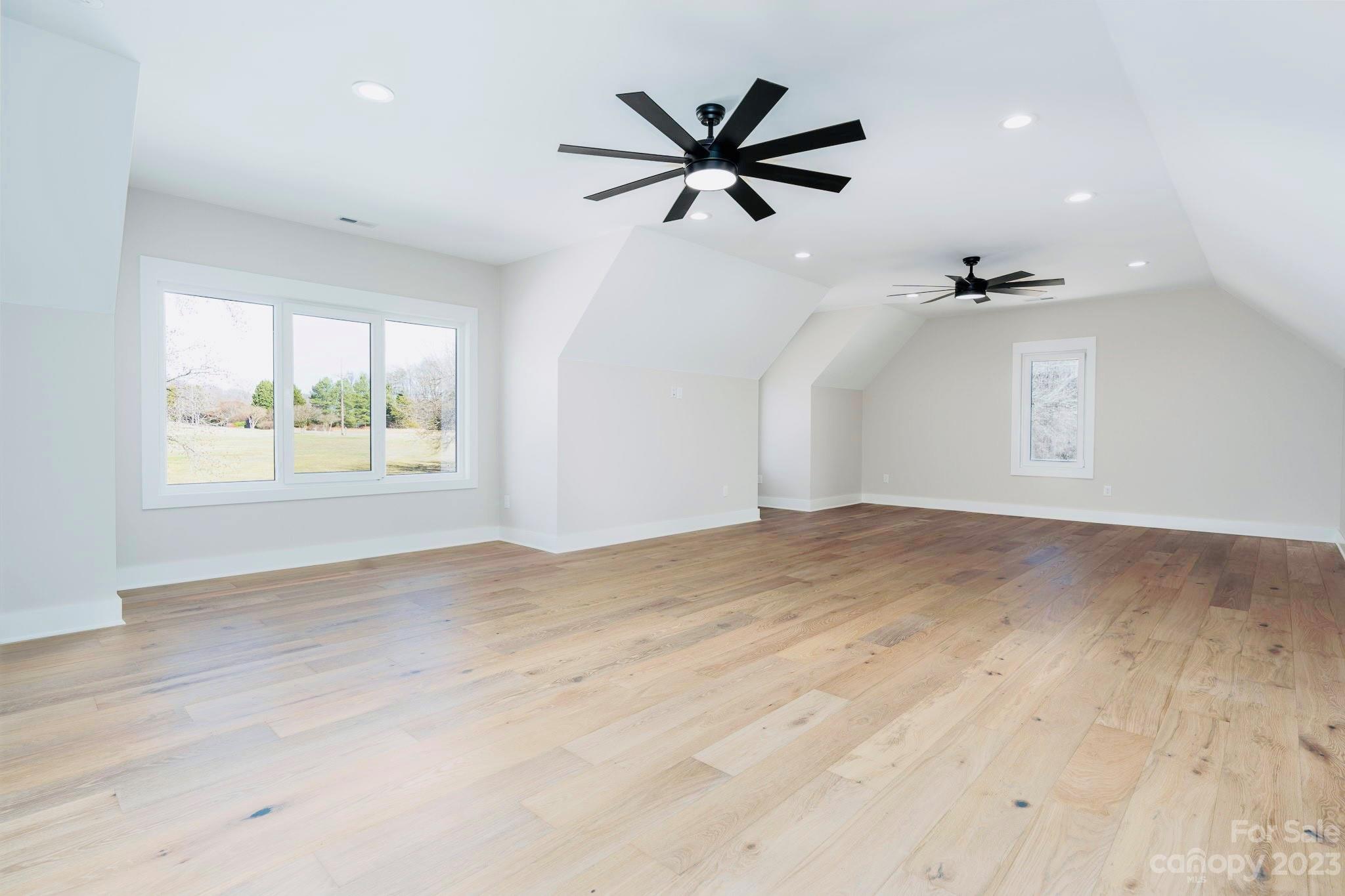 8527 Fieldstone Drive Terrell, NC 28682 - Photo 40 of 48 wooden floor in an empty room with a window