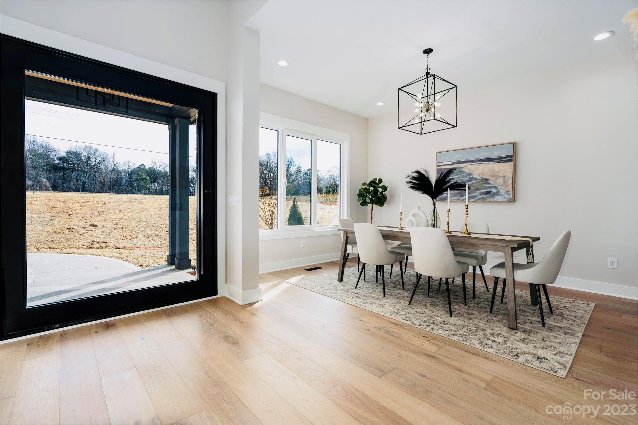 8527 Fieldstone Drive Terrell, NC 28682 - Photo 9 of 48 a view of a dining room with furniture window and outside view