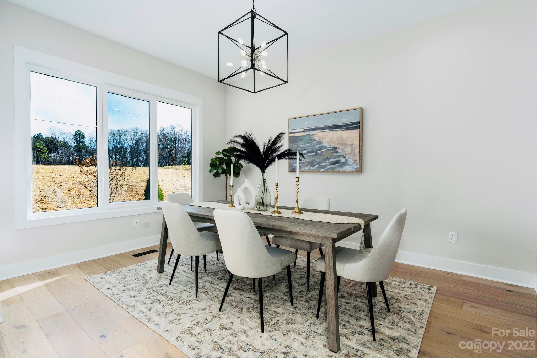 8527 Fieldstone Drive Terrell, NC 28682 - Photo 10 of 48 a view of a dining room with furniture window and outside view