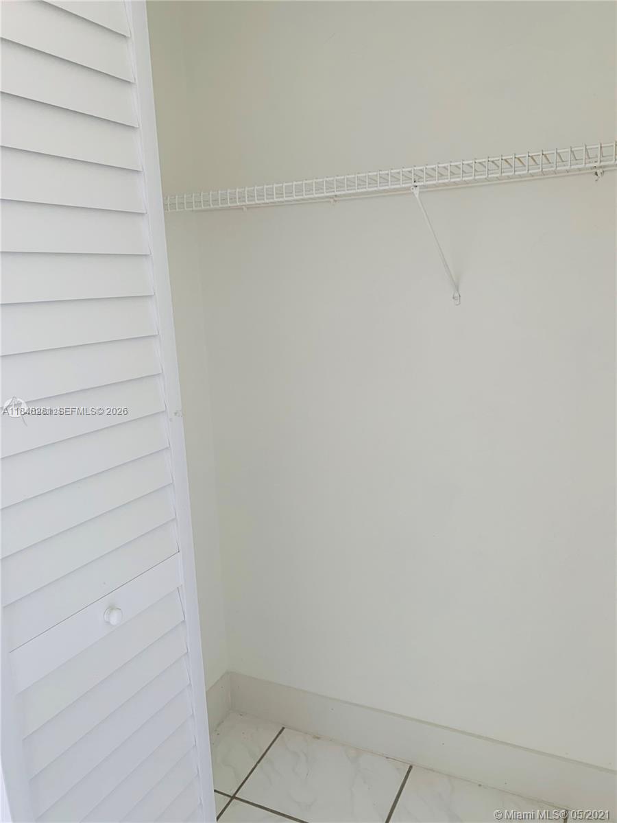 1325 West 68th Street, Unit 514 Hialeah, FL 33014 - Photo 11 of 20 a view of walk in closet